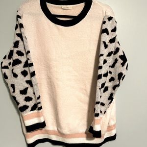 ANDTHEWHY S/M, blush leopard printed color blocked sweater. Lightly worn